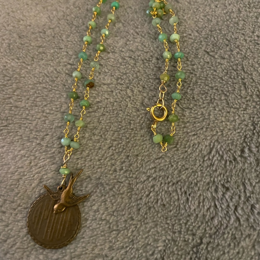 Green beaded “Amour” bird necklace